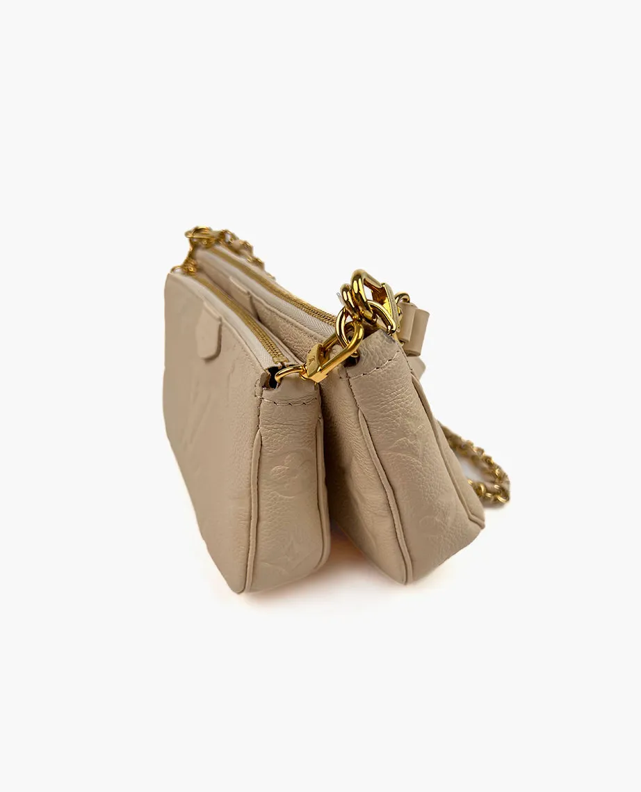 Louis Vuitton Monogram Empreinte Creme Multipochette